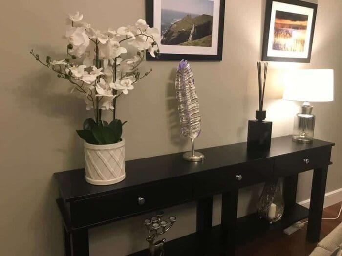Tastefully decorated black console table