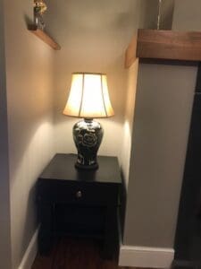 black side table with lamp