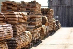 Bales of hardwood boards in timber yard