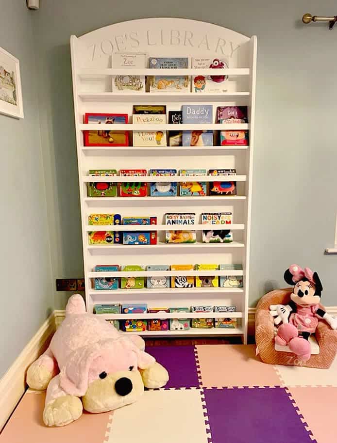 Large bookshelf for children's books with child's name engraved at the top