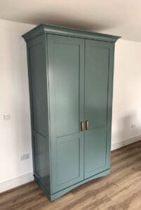 Tall light green cabinet