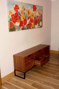 Walnut sideboard with open drawer