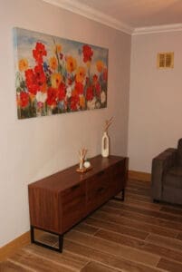 Walnut cabinet with black metal legs