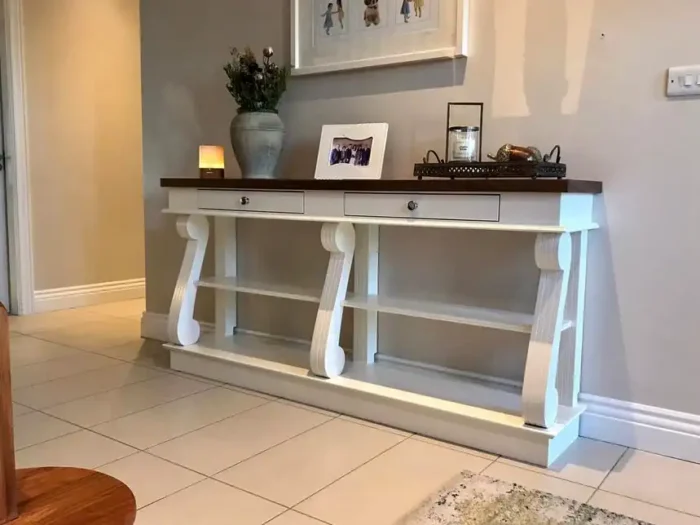 Console table with walnut top and scroll legs