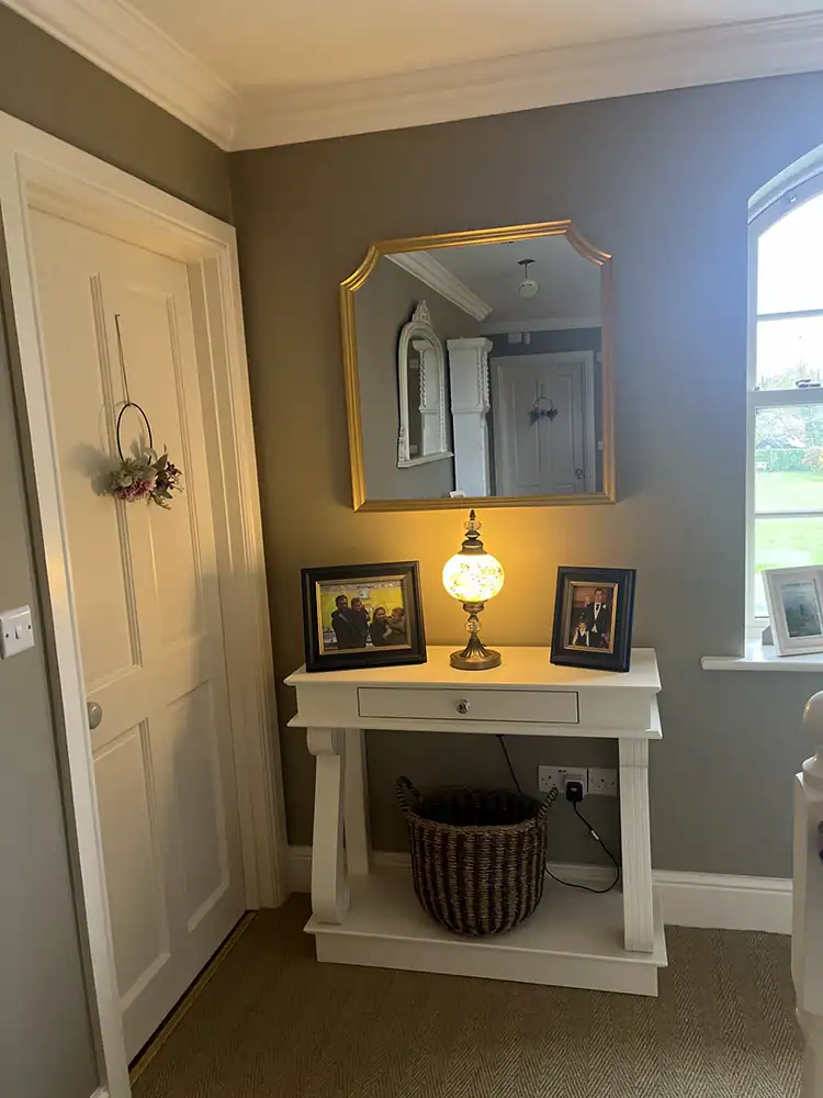 Console table with scroll legs