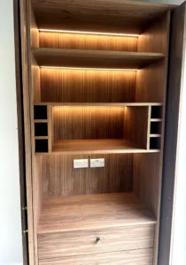 Walnut cabinet with recessed lighting