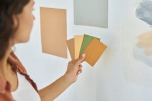 Testing paint samples on wall